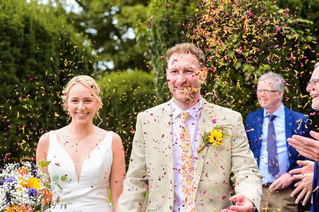 Confetti shot at Marketing Harborough wedding by Leicestershire Wedding Photographer Josie Parr