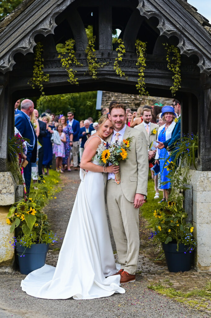 Wedding couple at Theddingworth church, Market Harborough, Leicestershire