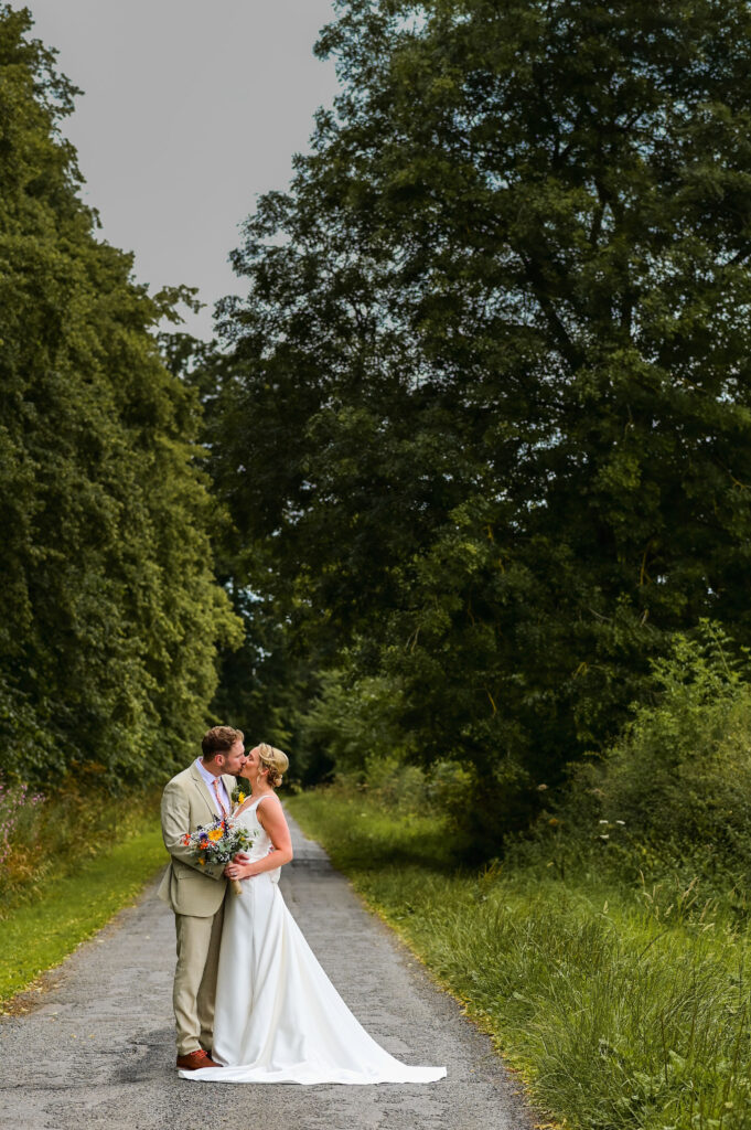 Wedding couple kissing in Lubbenham, Market Harborough, Leicestershire